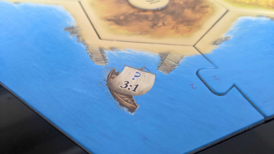 How to play Catan - photo of a harbor from Settlers of Catan