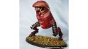 Warhammer 40k paint pot challenge - a pot of 'Khorne' red paint, customised to have two legs and a mouth full of teeth