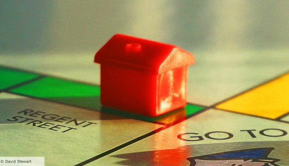 Monopoly Rules - David Stewart photo of a red Monopoly house