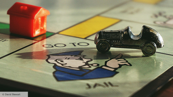 Monopoly Rule - David Stewart photo of a car on the 'go to jal' square in Monopoly