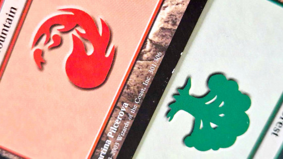 MTG color combination names guide - Wargamer original photo showing the red and green mana symbols on a Mountain and Forest card, to show the allied red and green colors.