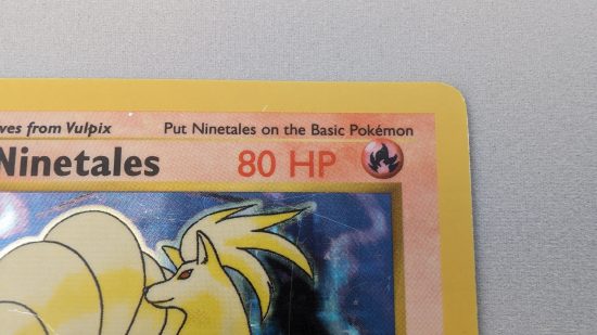 Shadowless Pokemon cards - detail of the HP text on a shadowless pokemon card, which has thin and slightly less heavily inked font