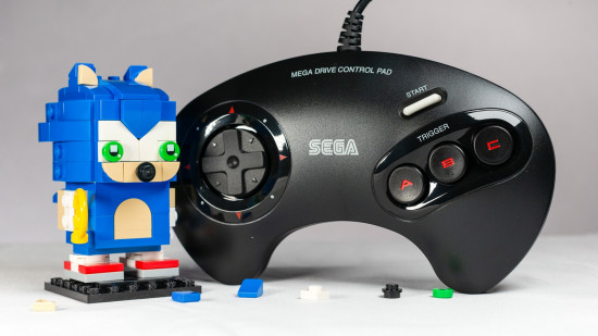 Lego Sonic the Hedgehog Brickheadz review image showing Sonic next to a Mega Drive controller to give a sense of scale.