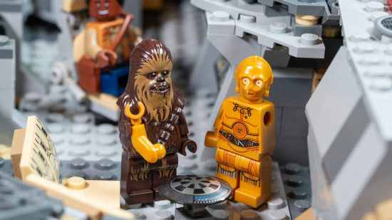 Lego Star Wars Millennium Falcon review image showing a close up of Chewbacca and C3PO in the ship.