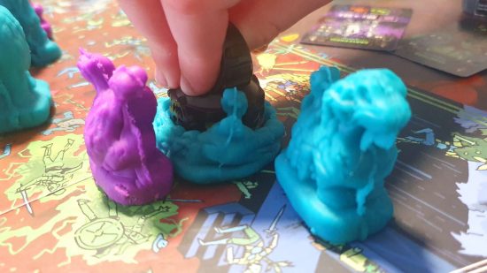 Necromolds review - a player crushes a clay monster under their caster ring