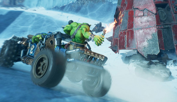 Warhammer 40k Speed Freeks screenshot, an Ork riding in the back of a buggy prepares to lob a fire bottle at a huge walking mech