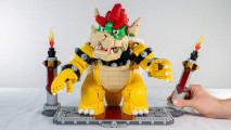 Lego Super Mario: The Mighty Bowser review image showing the Lego Bowser between two torches.