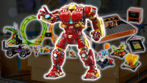 Lego 4th July sale deals - the Lego Marvel Hulkbuster armor, against a backdrop of a Lego Atari game console and a Lego loop the loop set