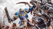 Key art from Warhammer 40k Space Marine 2 - the blue armored Space Marine Lt. Titus holds back a tide of ravenous Tyranid aliens, representing the game devs battling leaks
