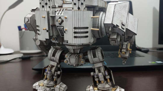 A papercraft Warhammer 40k Space Marine dreadnought crafted by Haron_fine, a blocky walker construct, rear view, showing unarmored leg pistons and heavy power pack