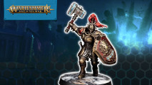 A Warhammer Age of Sigmar Stormcast Eternal with gold armor and a red shield and plume
